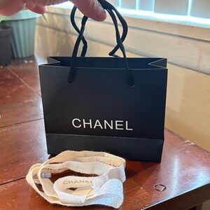 CHANEL Black Bag with White Chanel holiday Ribbon